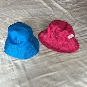 UV Skinz kids fuchsia and blue bucket hats in size 6 and 7